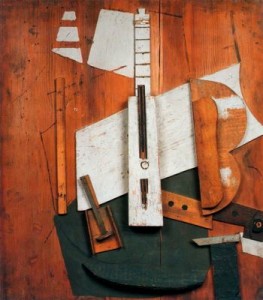 Guitarra y boella de Bass.1913. Picasso. Elementos de madera,papel carboncillo y clavo sobre panel de madera.Museo Picasso. París.