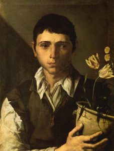 Muchacho con maceta de flores. El olfato.